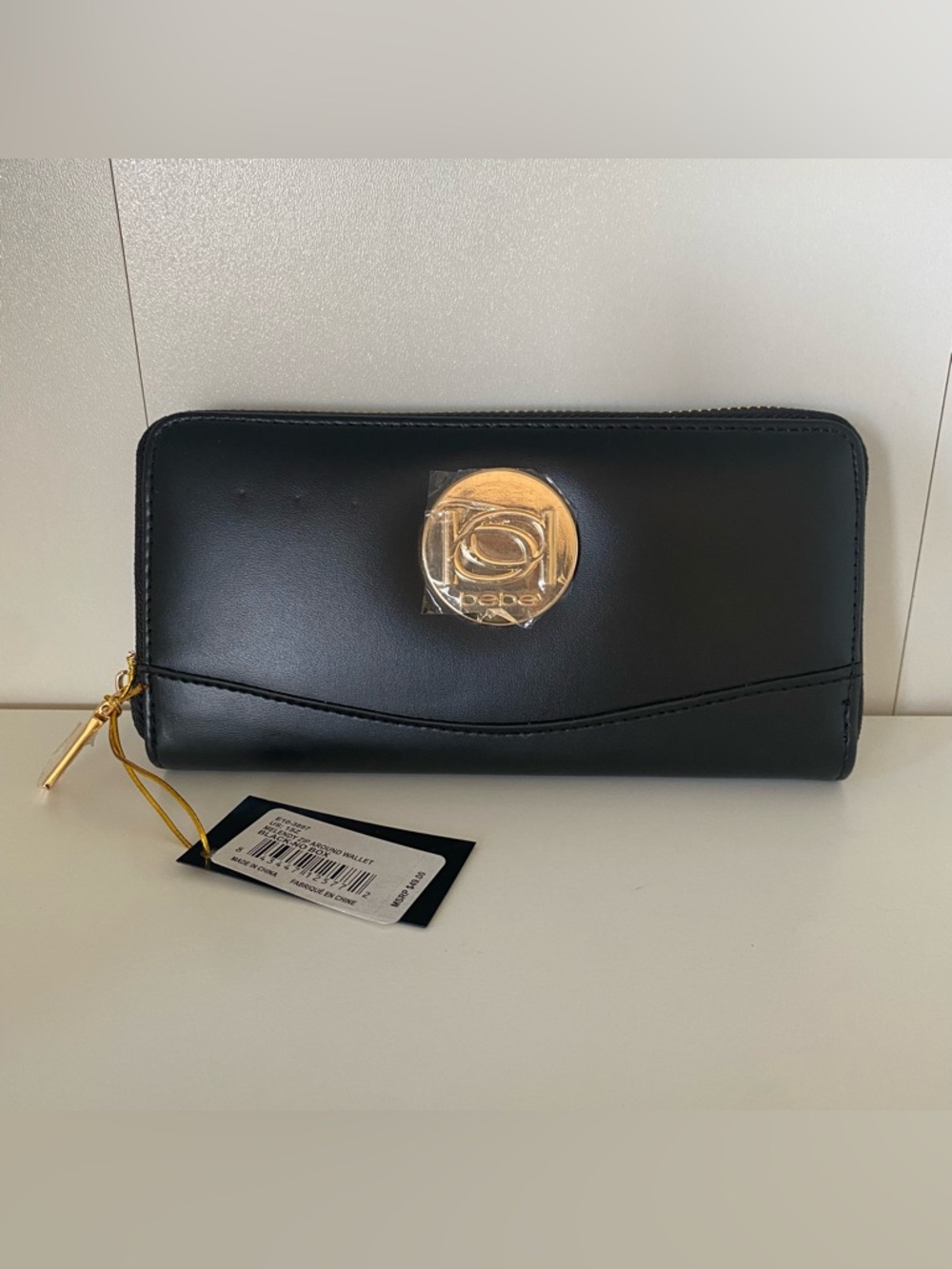 Bebe black zip around wallet with gold hardware